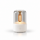 White ultrasonic aroma diffuser with warm ambient light