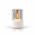 White ultrasonic aroma diffuser with warm ambient light