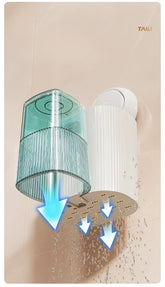Inverted rinse cup draining water from wall mounted holder