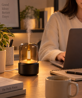 Black Amber Glow aroma diffuser on a home office desk
