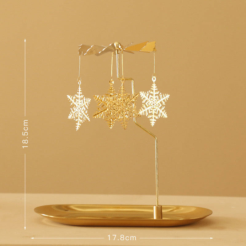 Snow flake rotary spinning tea light candle holder