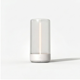 Minimal ambient table lamp in white with clear shade
